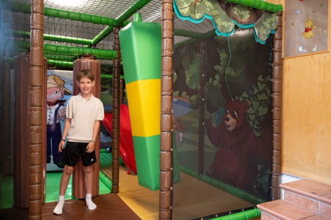 Indoor climbing course with a ball pit