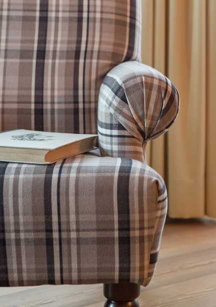 Gemütlicher Sessel, perfekt zum Rasten und Lesen eines Buches in der Turmsuite